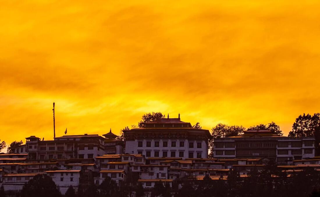 Tawang Monastery under a burning sky